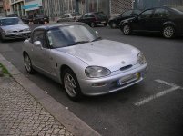 Suzuki Capuccino fr (1994).jpg
